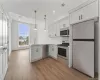 Open concept Kitchen with a Corner Island and high ceilings Open concept Kitchen with a Corner Island and high ceilings