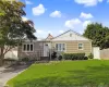 Charming ranch-style home featuring a gabled roof with metal accents, horizontal siding exterior, and a welcoming front entrance Charming ranch-style home featuring a gabled roof with metal accents, horizontal siding exterior, and a welcoming front entrance