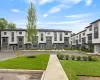 Surrounding community featuring a residential view and a yard Surrounding community featuring a residential view and a yard