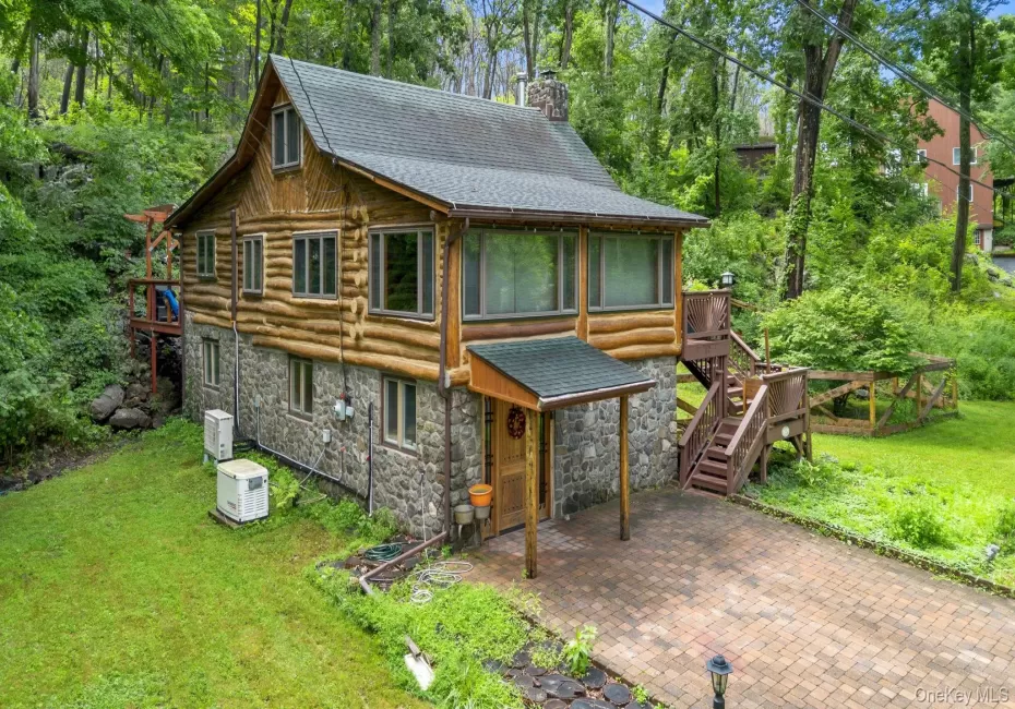 Authentic American chestnut log cabin located in the desirable Forest Knolls community on Greenwood Lake. Authentic American chestnut log cabin located in the desirable Forest Knolls community on Greenwood Lake.