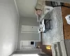 Windowed living room, Bathroom and walk-in closet Windowed living room, Bathroom and walk-in closet