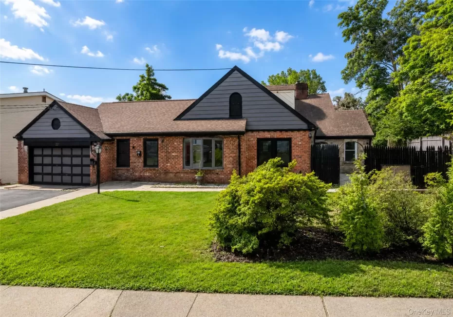 Welcome to 6 Truman Ave. A truly expansive home awaits just behind this picture perfect exterior. Welcome to 6 Truman Ave. A truly expansive home awaits just behind this picture perfect exterior.