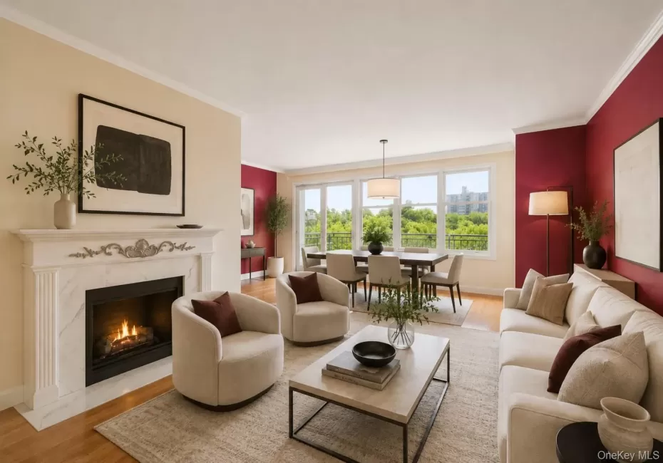 Spacious living area featuring a decorative fireplace with a mantel, crown molding, and wood-finish flooring Spacious living area featuring a decorative fireplace with a mantel, crown molding, and wood-finish flooring