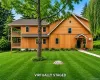 Board and Batten wood home with two side porches Board and Batten wood home with two side porches