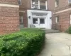 Property entrance featuring brick siding Property entrance featuring brick siding