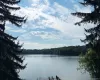 Set along one of Kirk Lake’s most secluded stretches, this exceptional waterfront property Set along one of Kirk Lake’s most secluded stretches, this exceptional waterfront property